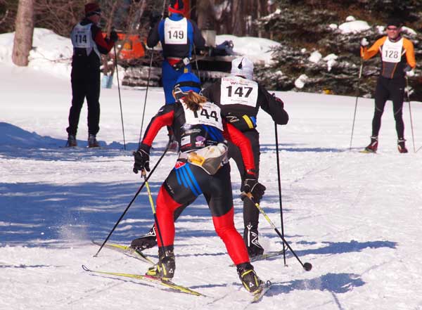 Laura Webb beats Susan Vigland for 2nd place at the finish of the Forbush Corner 17K cross country ski race