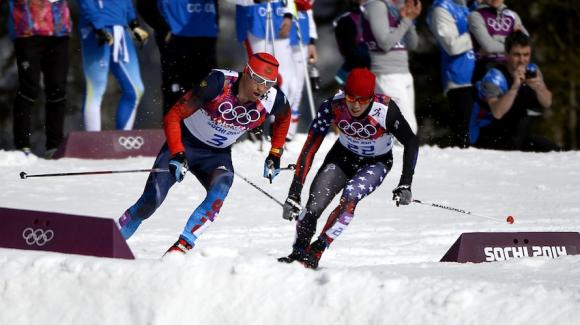 Here is Noah Hoffman (right) chasing race-winner Alexander Legkov of Russia. Hoffman finished 26th after an impressive performance Sunday at the 50k cross country race, the final event of the 2014 Sochi Olympic Winter Games. (Getty Images/AFP/Pierre-Philippe Marcou)