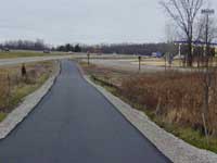 Nice pavement! Looking east from Kent Lake Road. I-96 is on the left; Grand River is on the right.
