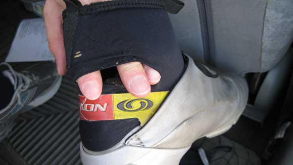 Salomon ski boot with a big hole in it