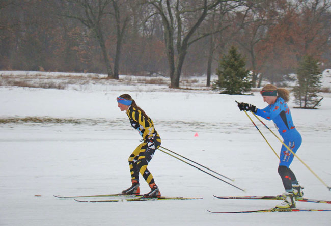 Women racing at the Frosty Freestyle cross country ski race