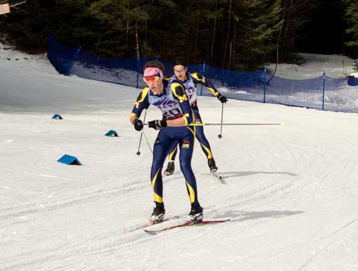 Senior Ellen Wiitala skiing to 4th place in the Women's 15km Classic at the  USCSA National Championships in Lake Placid, NY