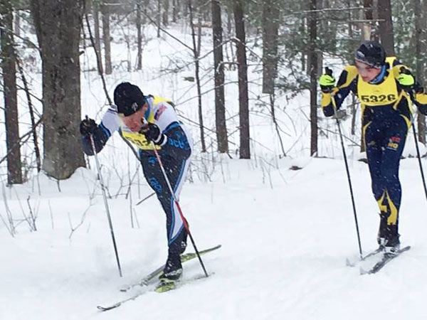 Milan holding off Lars Hallstrom 1km from the finish in the Vasa 16km Classic for 2nd place overall