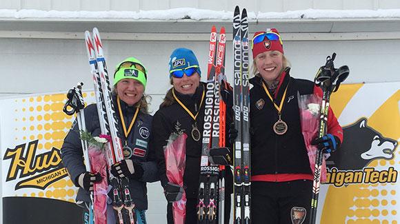 Rosie Brennan stands atop her third podium of the week, winning the freestyle sprint to wrap-up the U.S. Cross Country Championships.