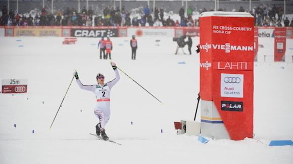 Jessie Diggins lunges for the finish to take second place. (Richard Narum)