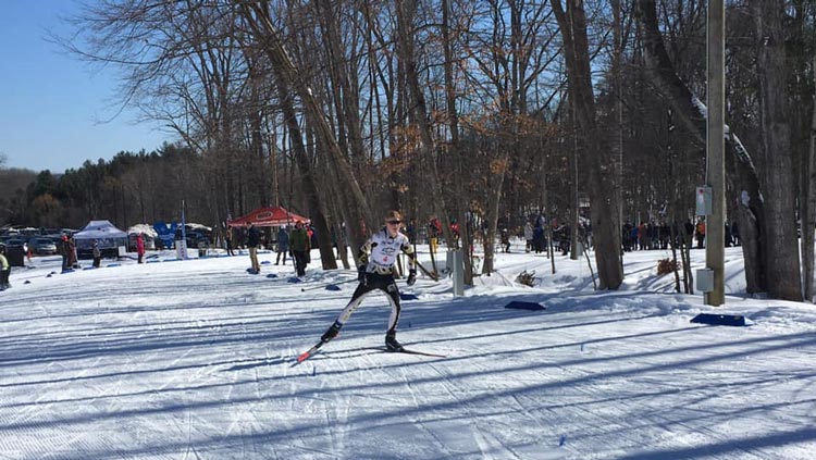 Skating racer at Michigan High School Cross Country Ski Championships 2020