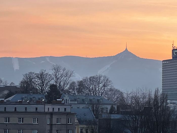Sunset in Liberec, tower hotel at the top of the downhill area