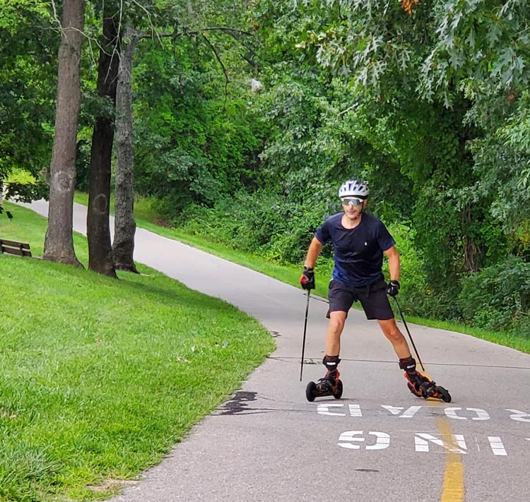 Mike Hultman on the second of three 8.5 mile laps around Kensington Metropark this past Sunday, August 21. Although it looks somewhat flat, he's actually climbing a steep hill.