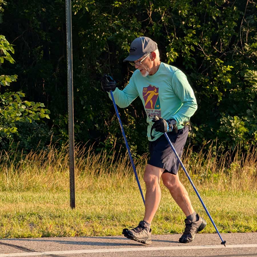 Ski waaking is a great alternative to rollerskiing. You can do long slow distance at an easy pace, intervals at any heart rate you can get to, or speed work. Tony Percha is doing easy repeats up a long hill at Kensington Metropark in Milford, MI.