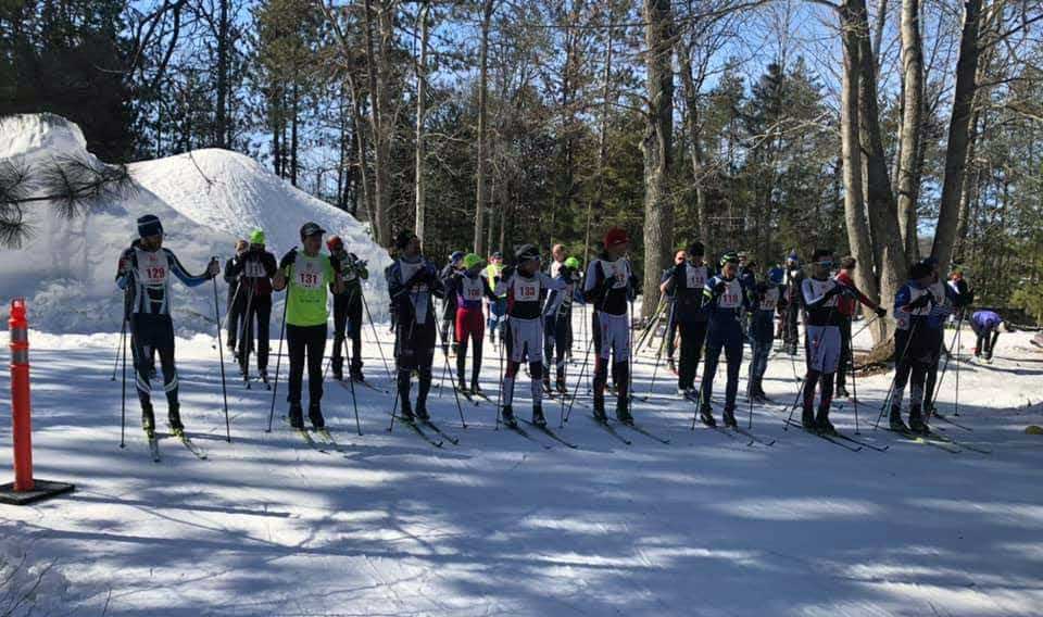 Start line of xc skiers at 2021 Michigan Cup Relays