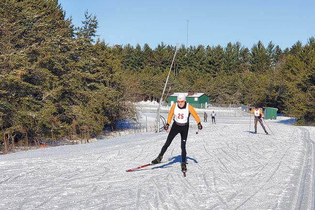 Robin Luce skis to the finish line