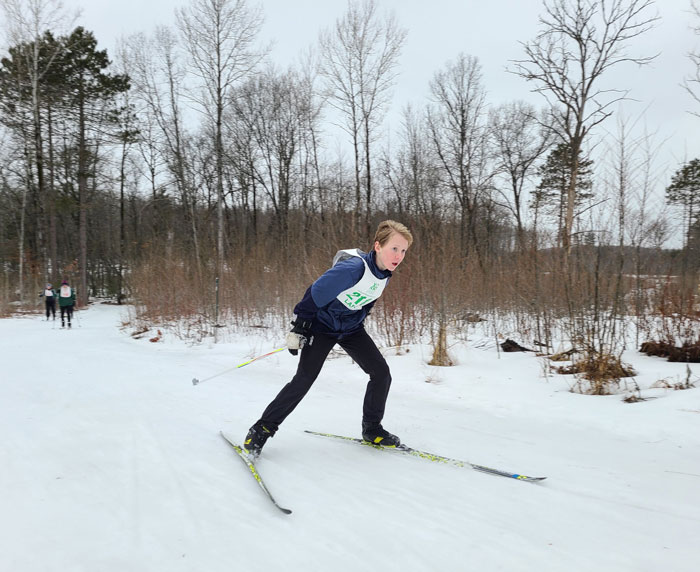 Michigan Cup Relays skate cross country skiers on course