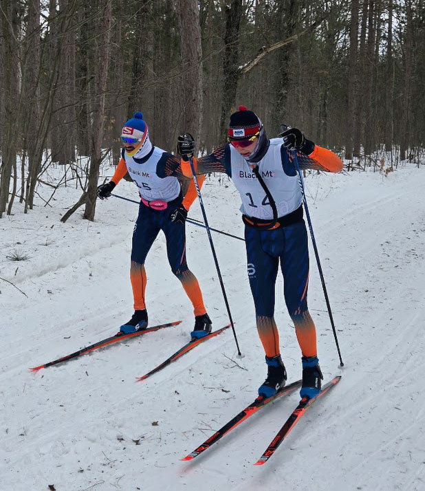 Ryan Harris and Drew Moore sprint for the finish