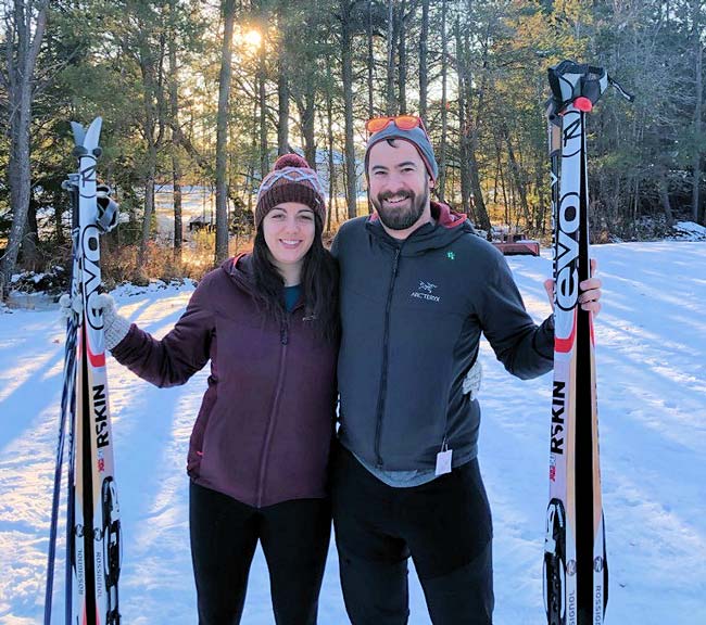 Two cross country skiers at the Cross Country Ski Headquarters